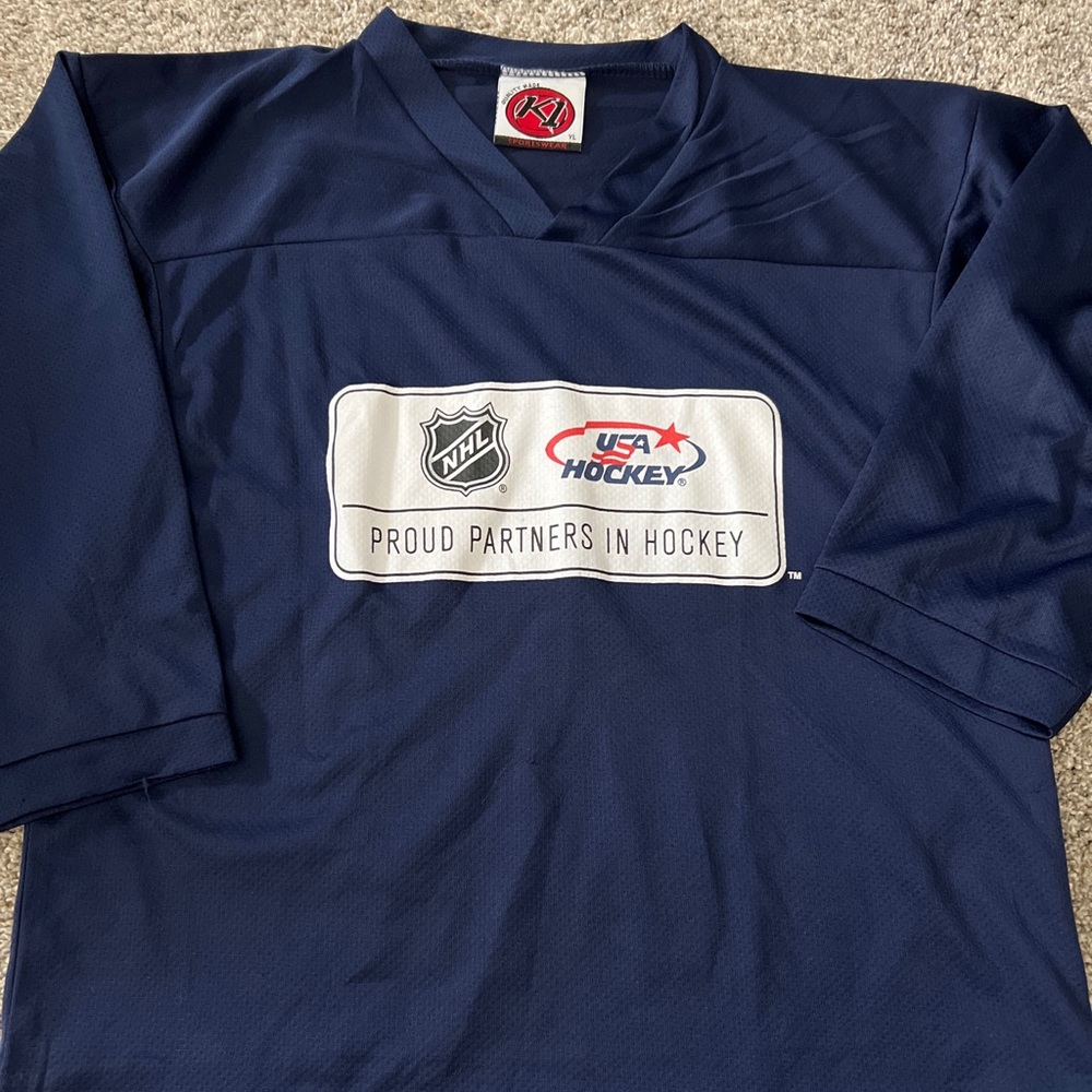 Youth large navy blue ice hockey jersey